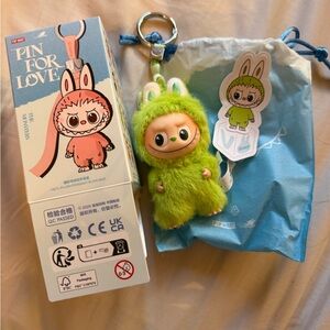 Pin for love Labubu “v”